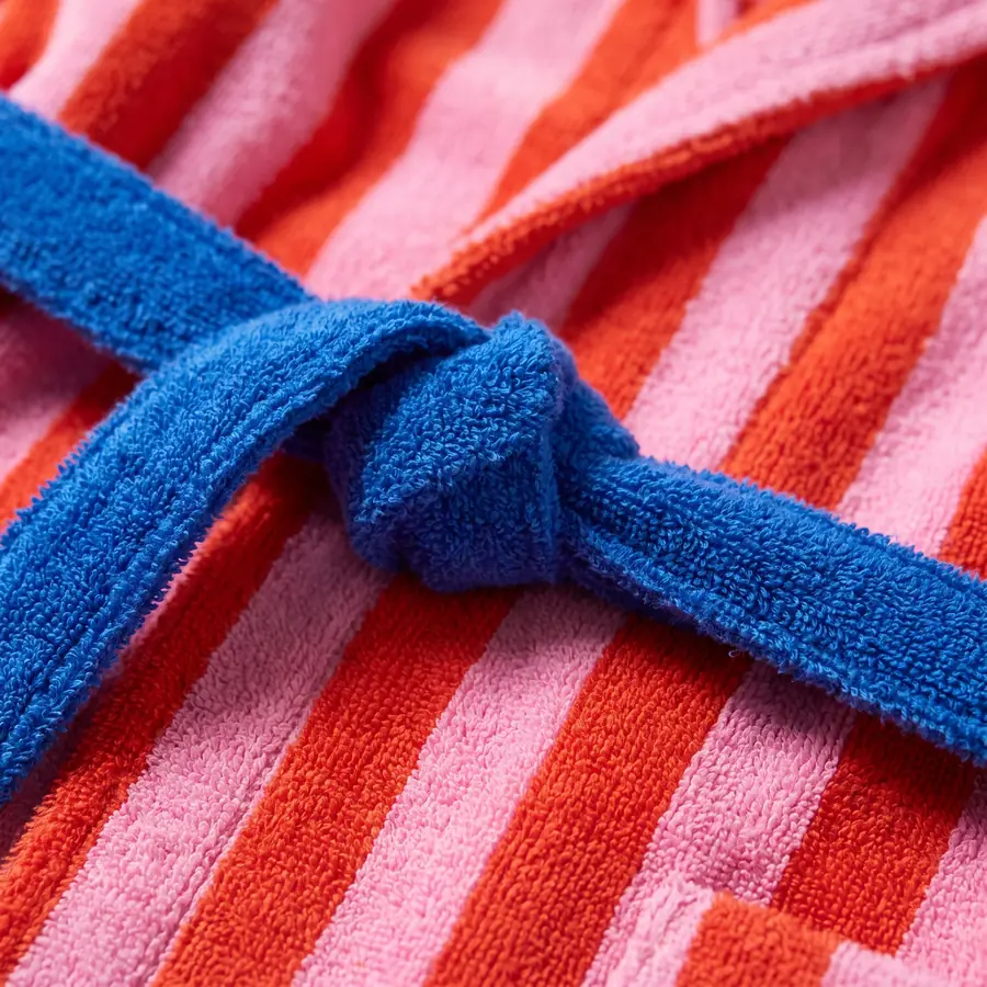 The terry texture of the bathrobe and the knot of the blue belt